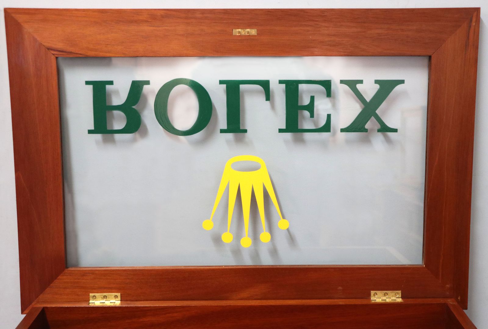 photo buy A Superb Bijouterie Display Table, Hand Sign Written With The Famous Rolex Watch Emblem.