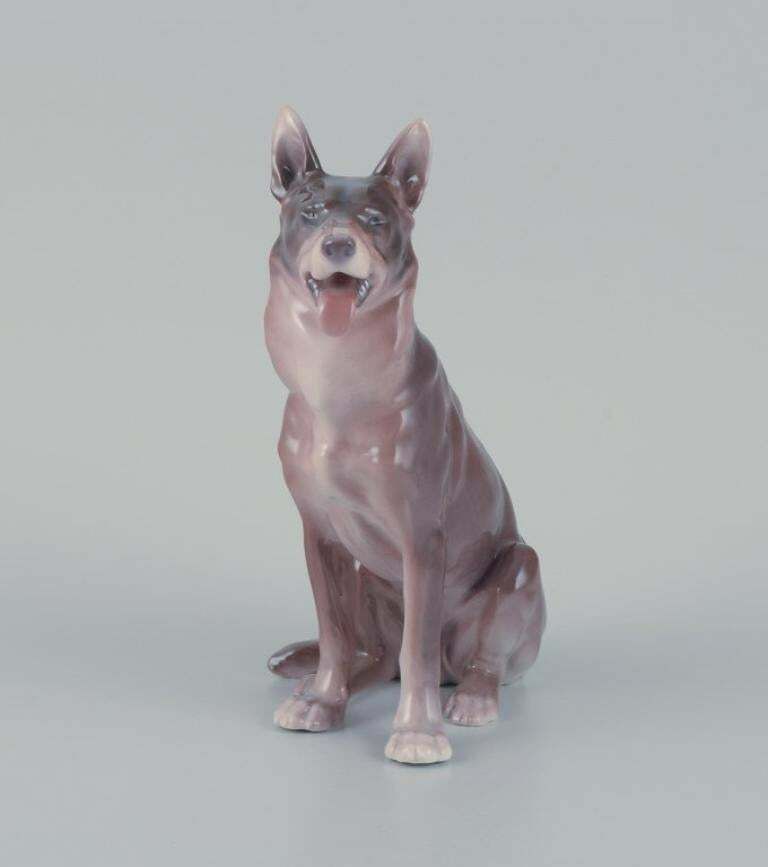 Bing & Grøndahl, Porcelain Figurine Of A Sitting German Shepherd. photo for sale