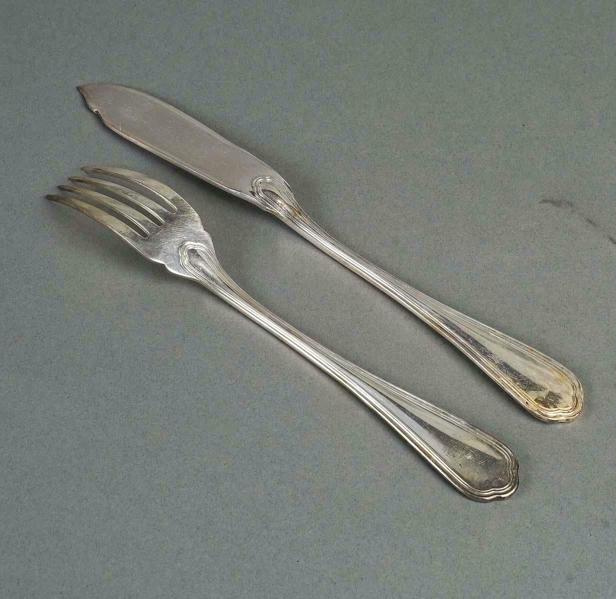 Fish Service With 12 Forks And 12 Fish Knives By The Silversmith Christofle. photo vinterior