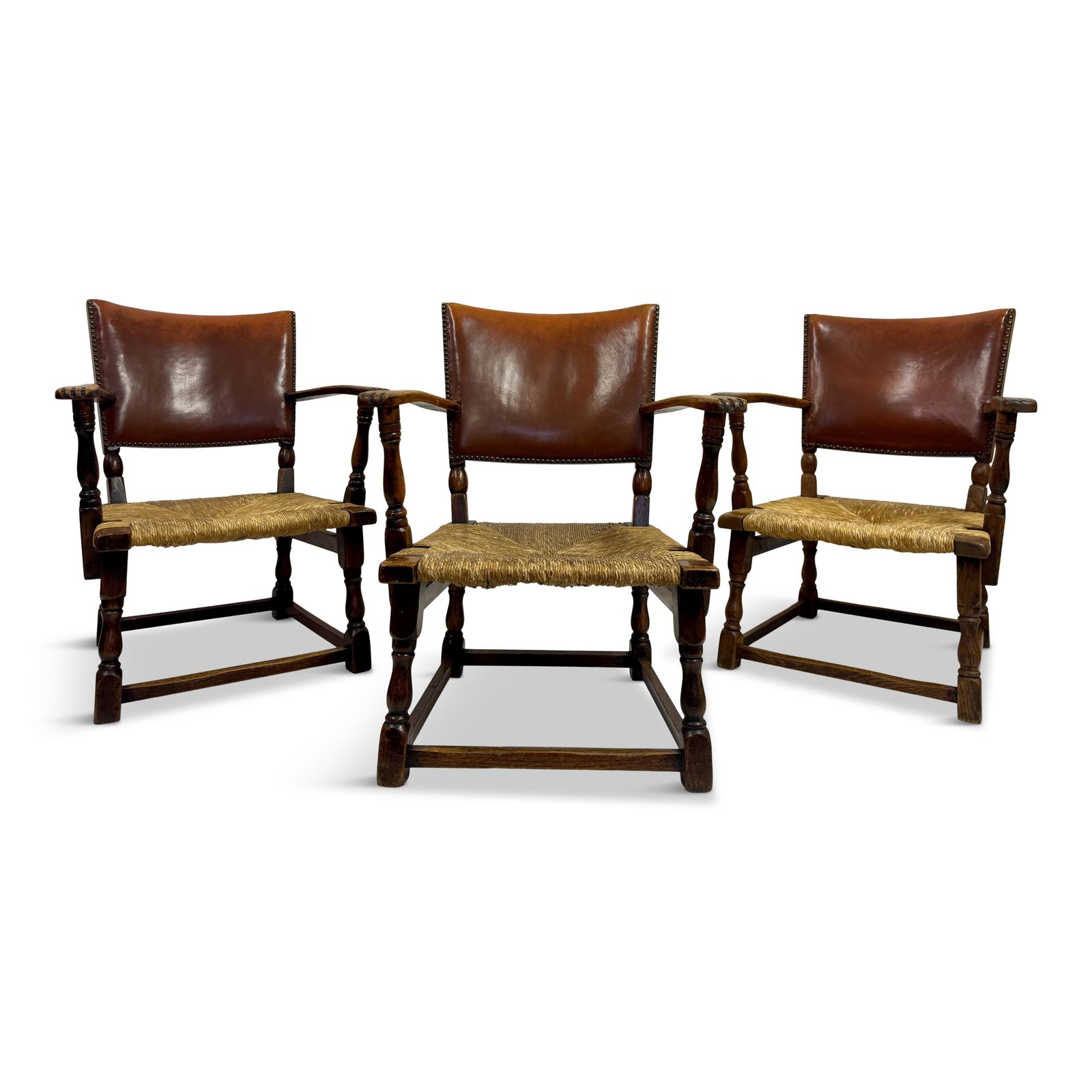 Set Of Three Oak Armchairs With Rush And Leather Seats