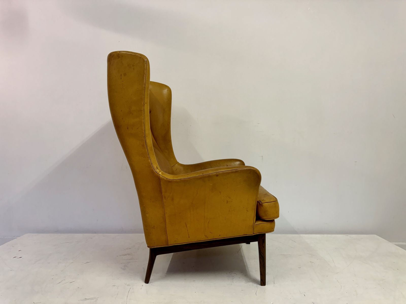 photo furniture 1970s Patinated Leather Wingback Krister Armchair By Arne Norell
