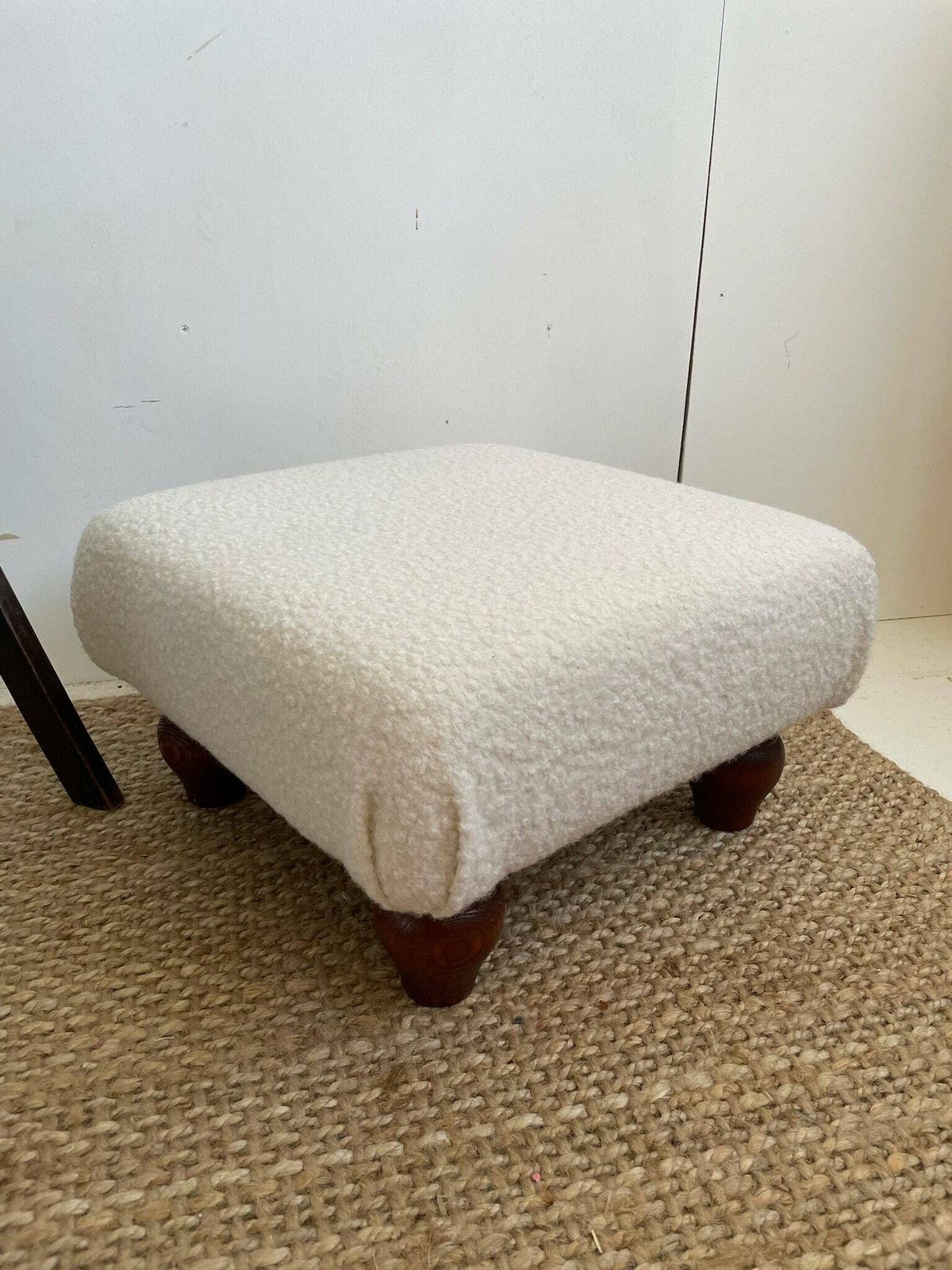 Chunky Low Lying Footstool With Tapered Legs And Cream Boucle Fabric photo Furniture