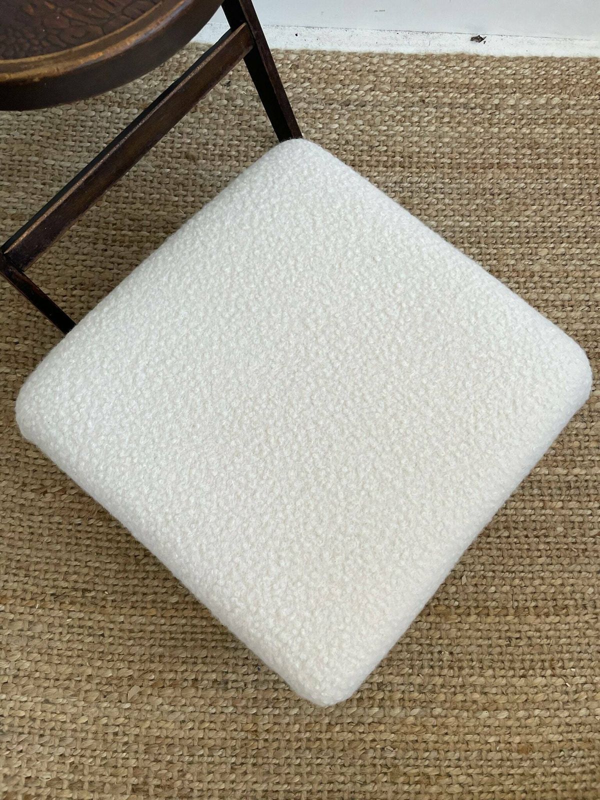 Chunky Low Lying Footstool With Tapered Legs And Cream Boucle Fabric photo vinterior