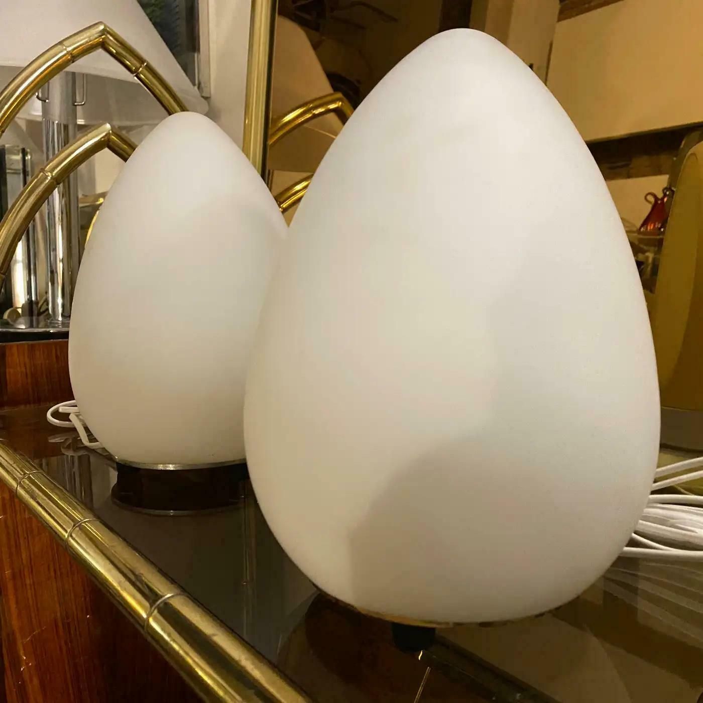 Two 1990s Modernist Opaline White Glass Italian Egg Bed Lamps By Lumen Center photo for sale