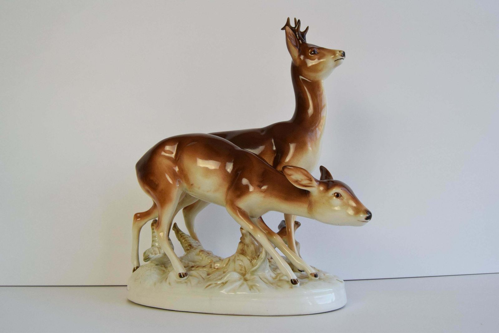 Porcelain Deer And Doe Sculpture By Royal Dux, Circa 1950's. photo for sale