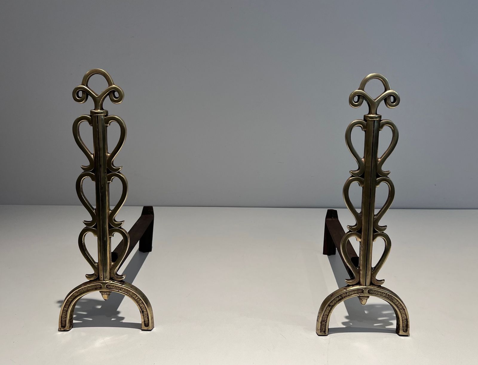 Pair Of Andirons In Brass And Wrought Iron In The Style Of Raymond Subes photo furniture
