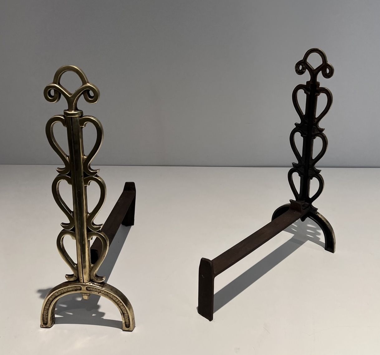 Pair Of Andirons In Brass And Wrought Iron In The Style Of Raymond Subes photo 1250.0