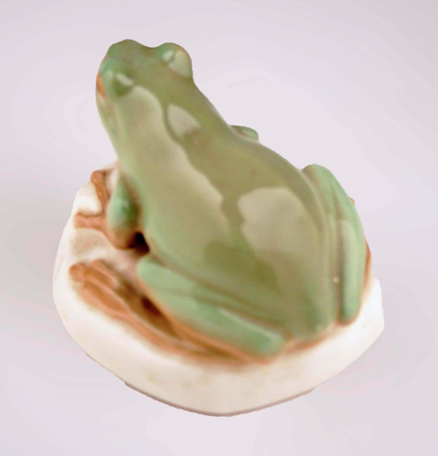 Mid 20th Century Modern German Glazed And Painted Porcelain Frog Sitting On A Rock By Manufacturer Nymphenburg photo vinterior