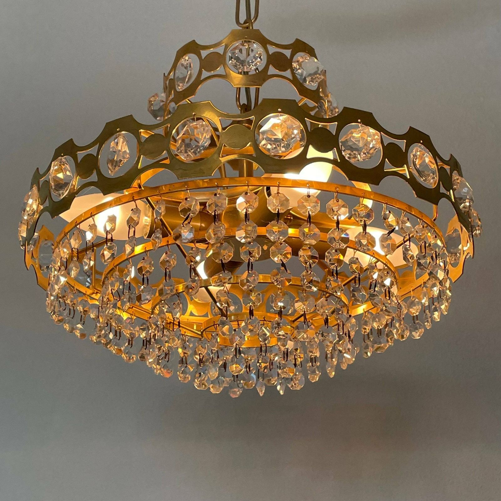 Swedish Mid Century 1970s Luxury Chandelier In Gold Metal With Crystal Cut Glass And Beautiful Details photo furniture