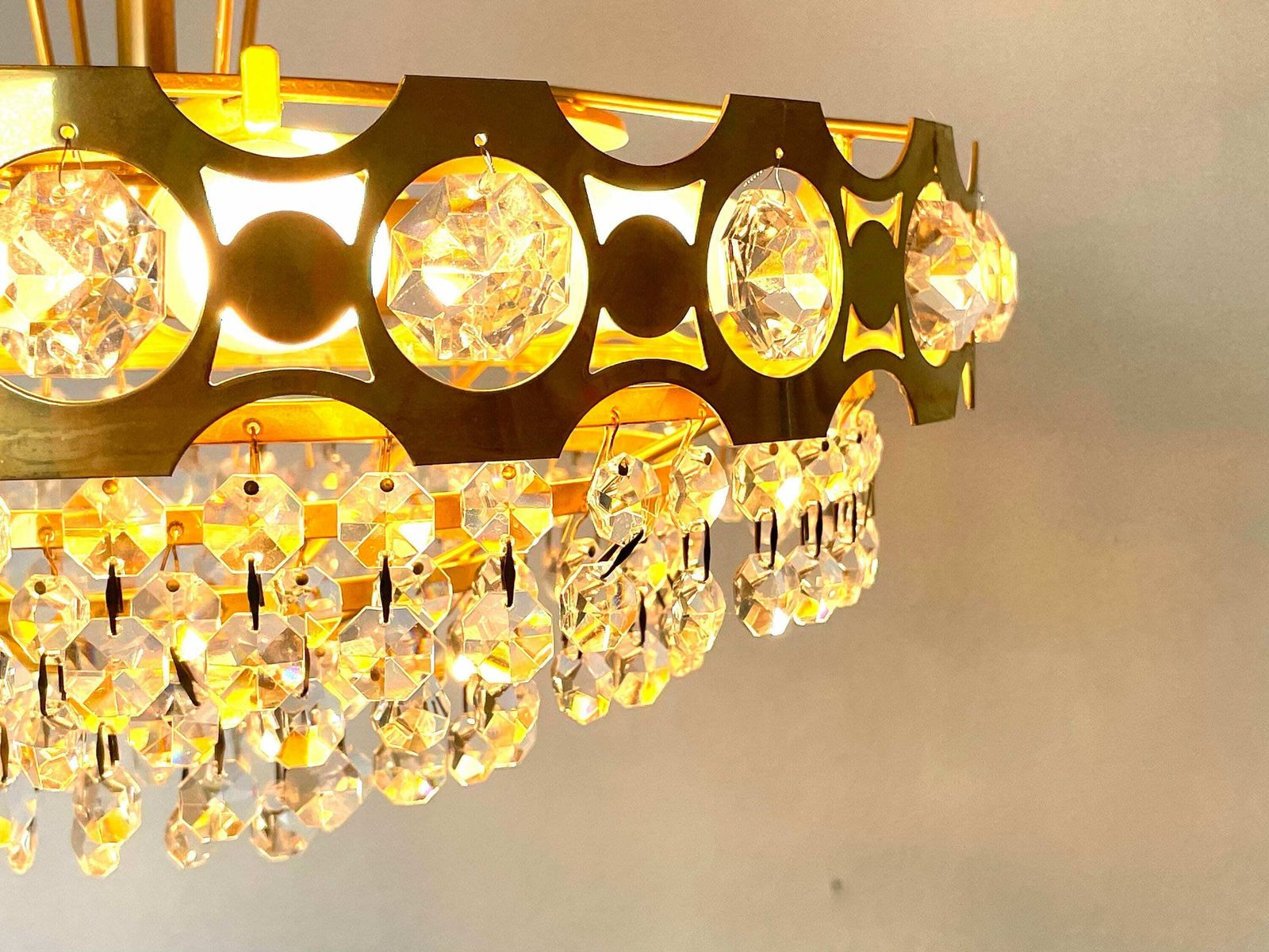 Swedish Mid Century 1970s Luxury Chandelier In Gold Metal With Crystal Cut Glass And Beautiful Details photo for sale