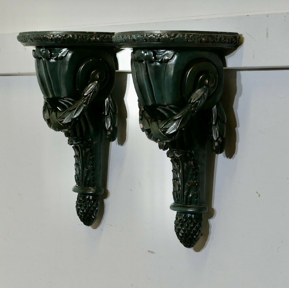 A Pair Of 19th Century Green Wall Brackets