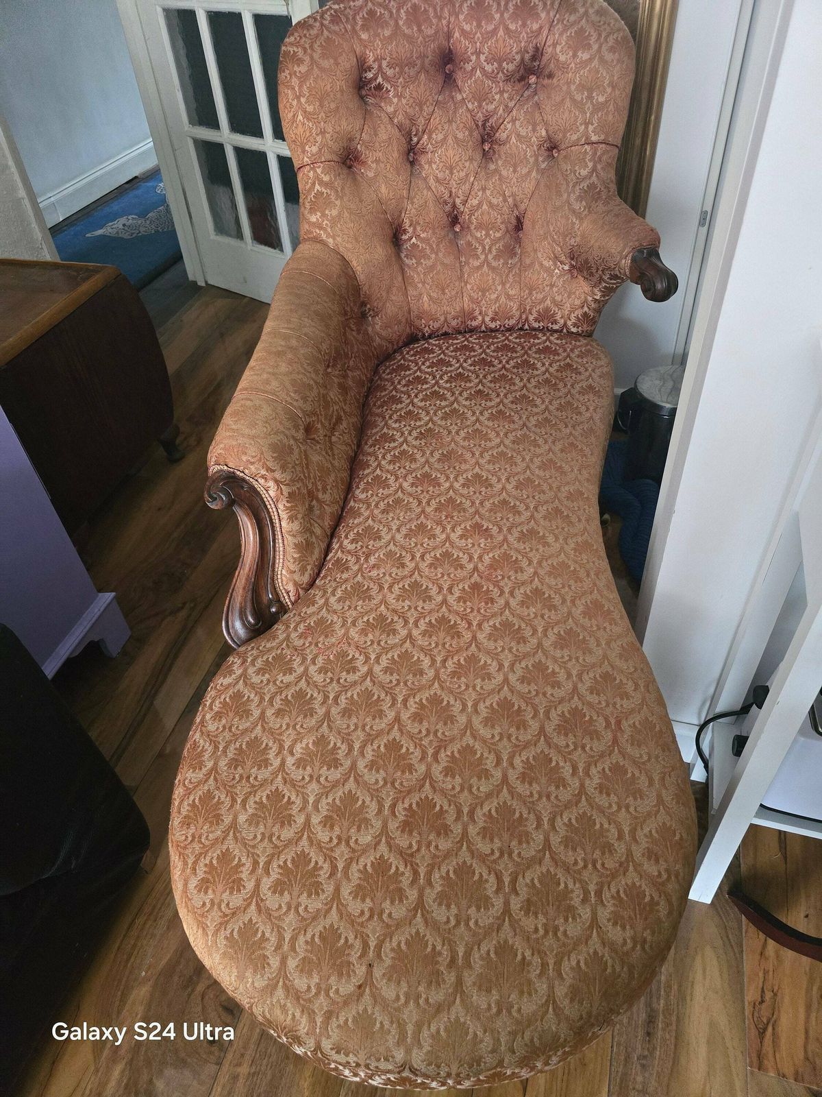 A Victorian Mahogany Show Frame Chaise Longue With Raised Back, Upholstered In Buttoned Floral Material photo 590.0