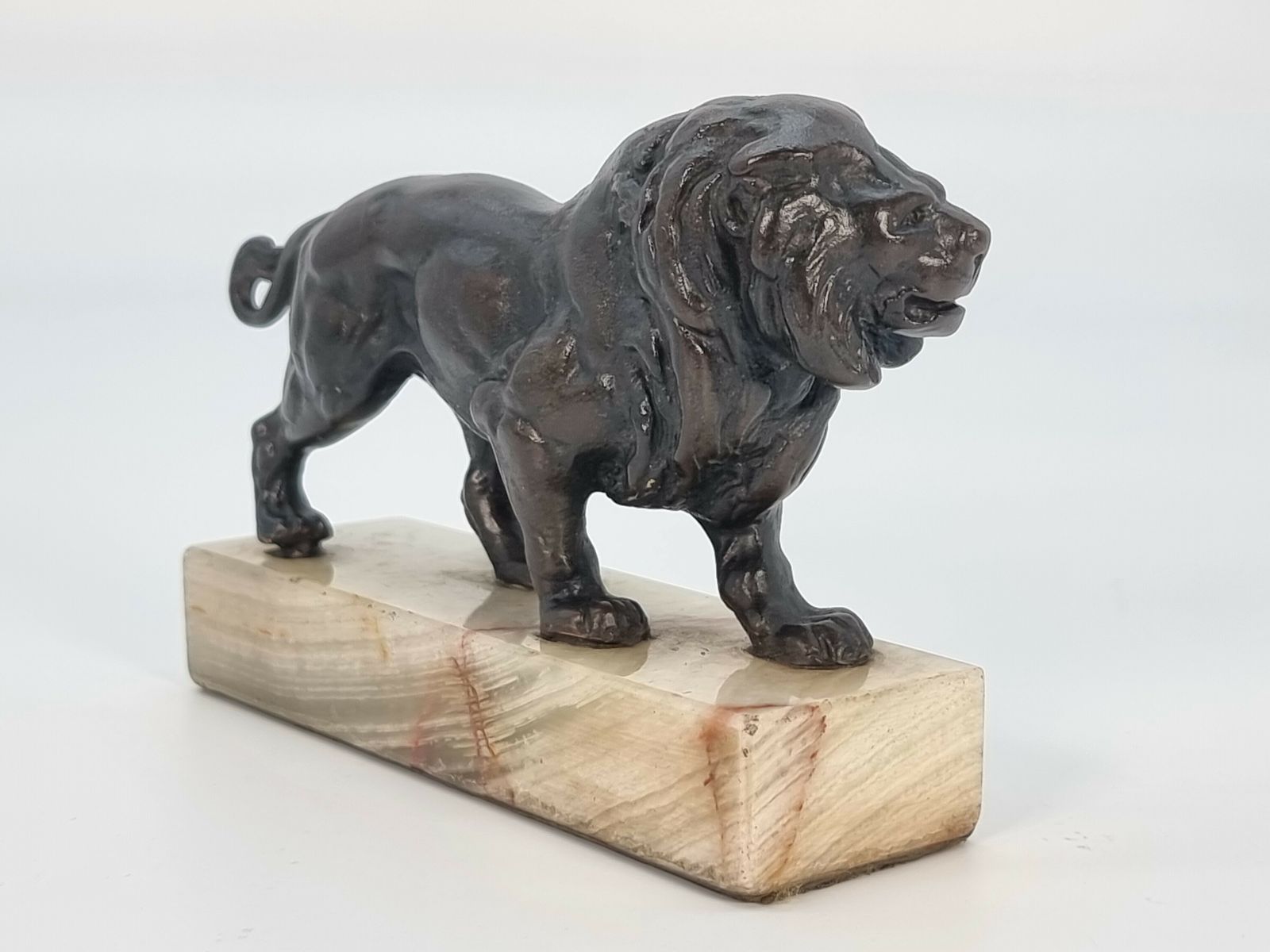 A French Late 19th Century Bronze Study Of A Prowling Lion photo furniture