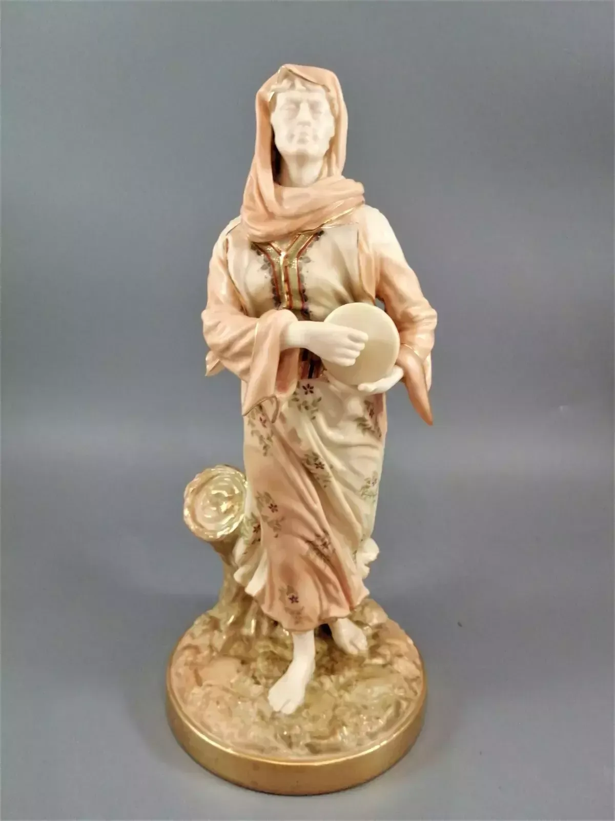 A Rare Royal Worcester Figurine Titled "Musician," Depicting A Lady With A Drum