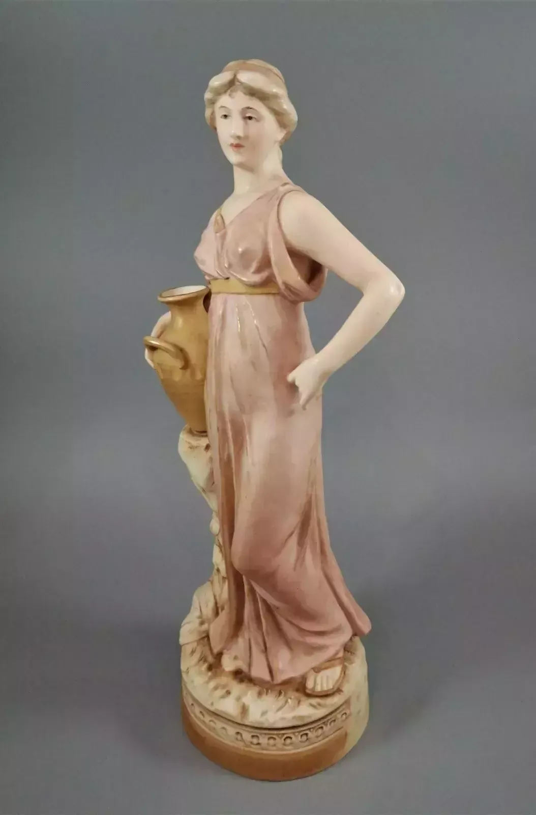 Beautiful Antique Royal Dux Porcelain Figurine Depicting A Lady Holding A Jug. photo furniture