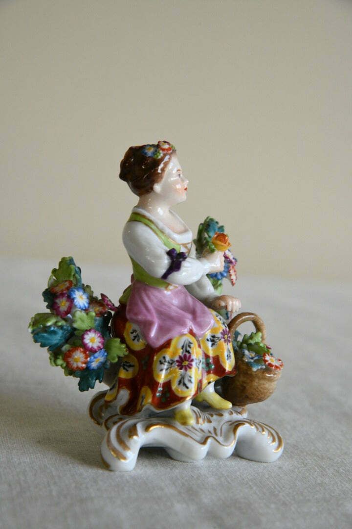 Ornament Girl And Basket Of Flowers photo furniture