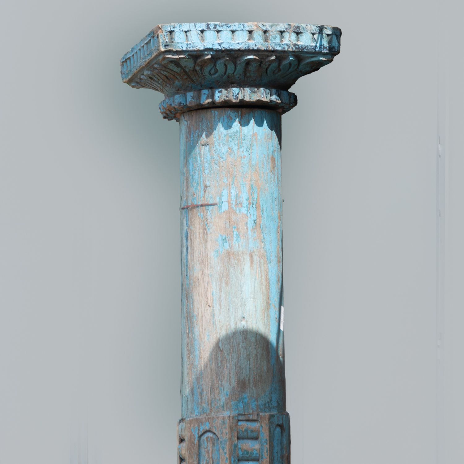 Pair Of Reclaimed Blue Carved Indian Columns On Wooden Plinths photo Home Decor