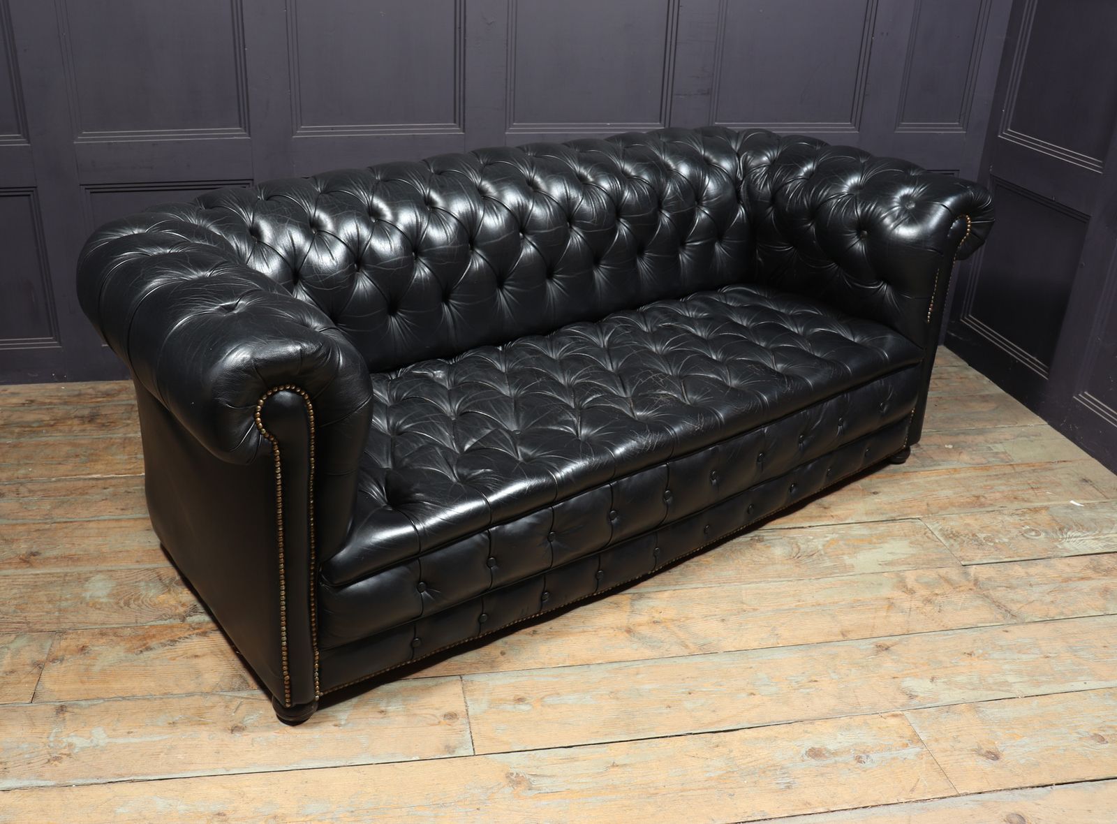 Black Leather Buttoned Seat Chesterfield Sofa photo vinterior