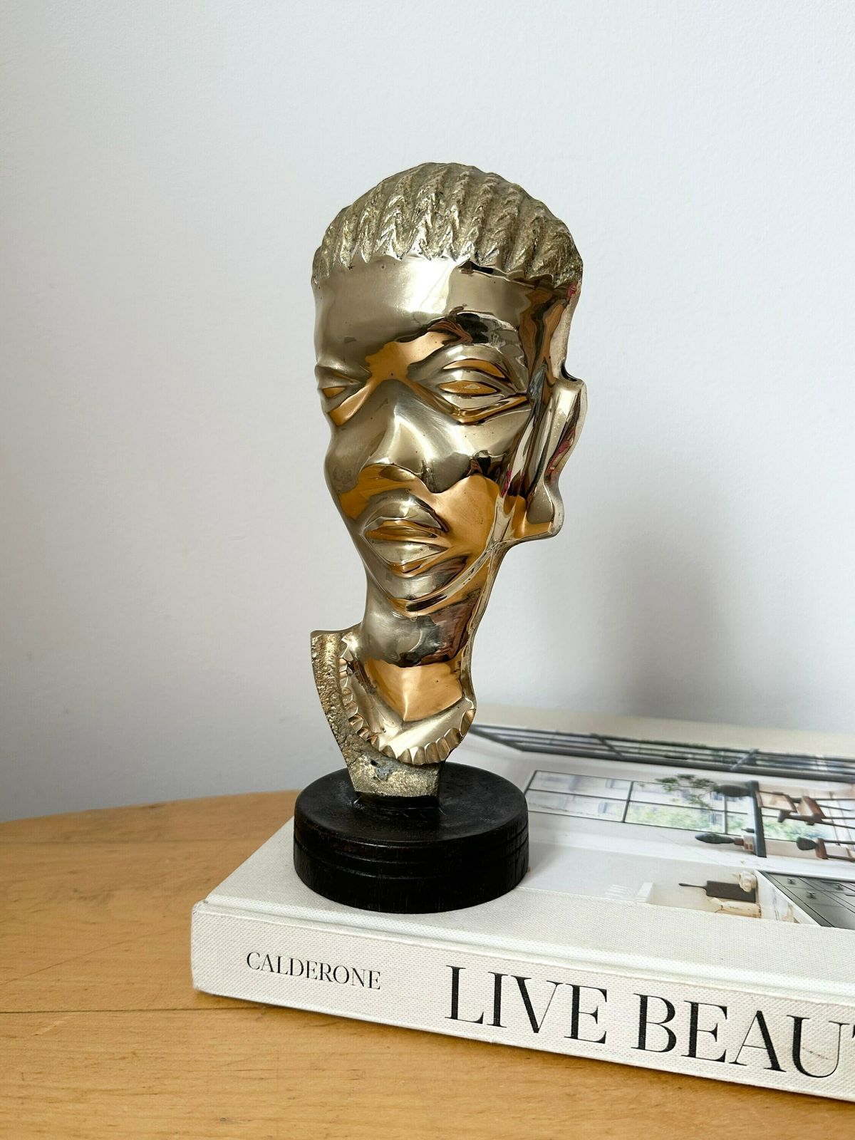 photo furniture Vintage African Brass Head Sculpture On Wooden Stand