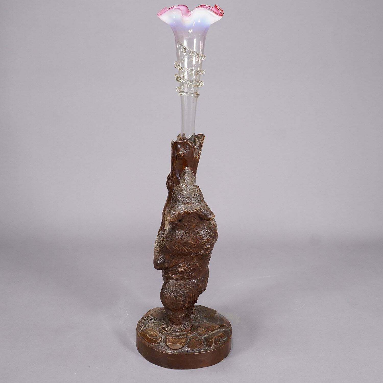 A Wooden Carved Black Forest Bear With Glass Vase Ca. 1900s photo for sale