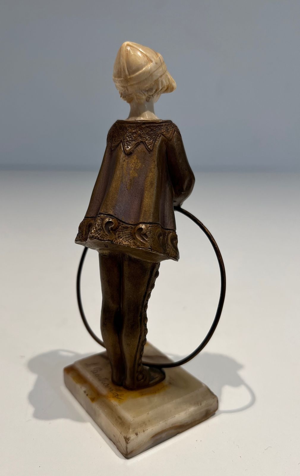 1850.0 Chryselephantine Representing A Young Girl With A Hoop Signed Bertrand On Its Onyx Base photo