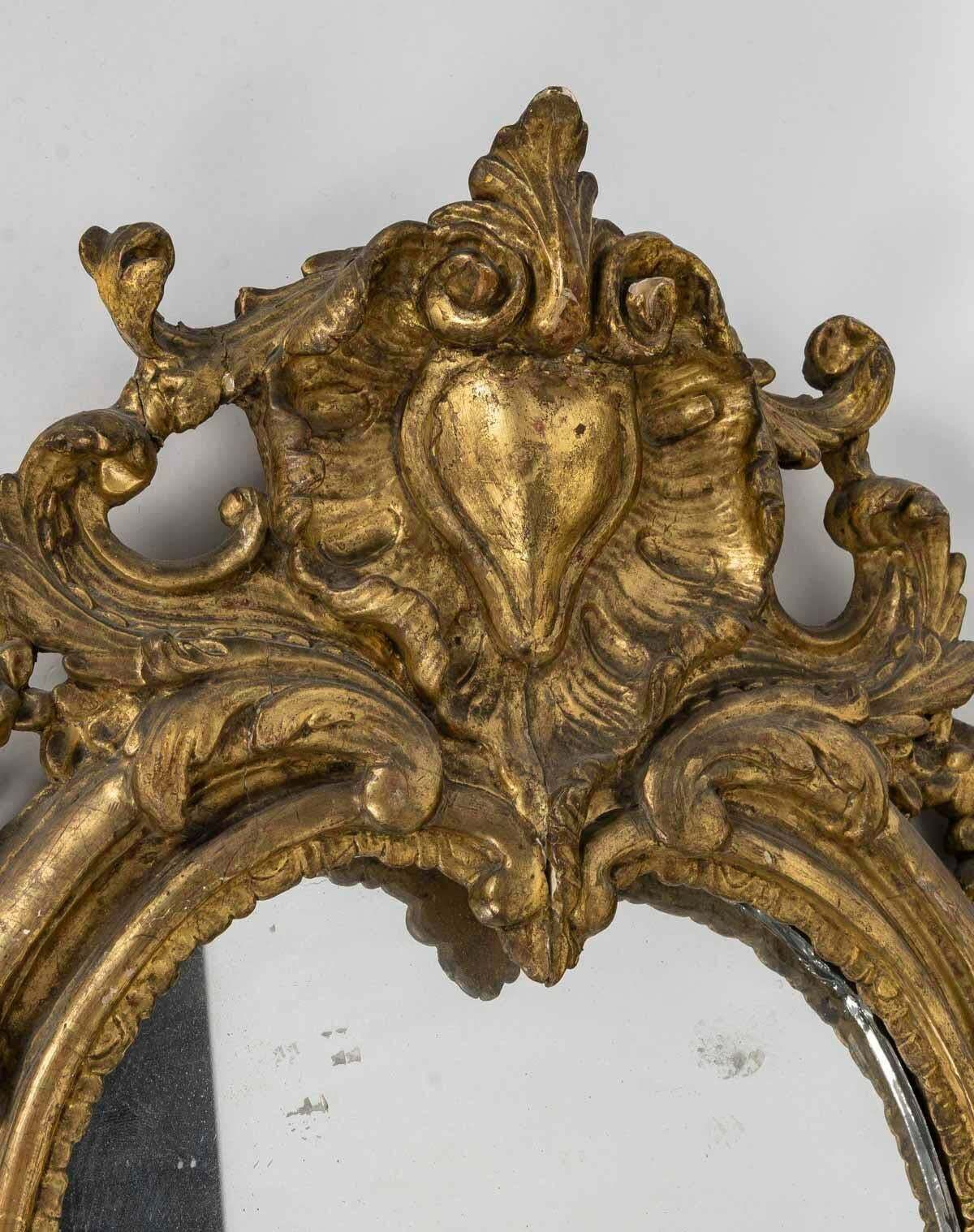 A Louis XV Period Carved And Gilded Wood Wall Mirror, 18th Century. photo for sale