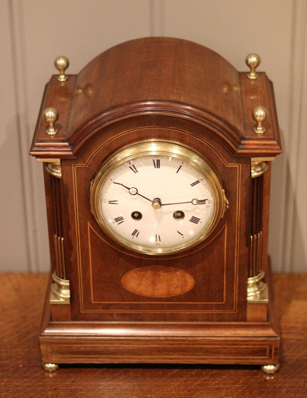 photo furniture Mahogany And Inlay Arch Top Bracket Clock