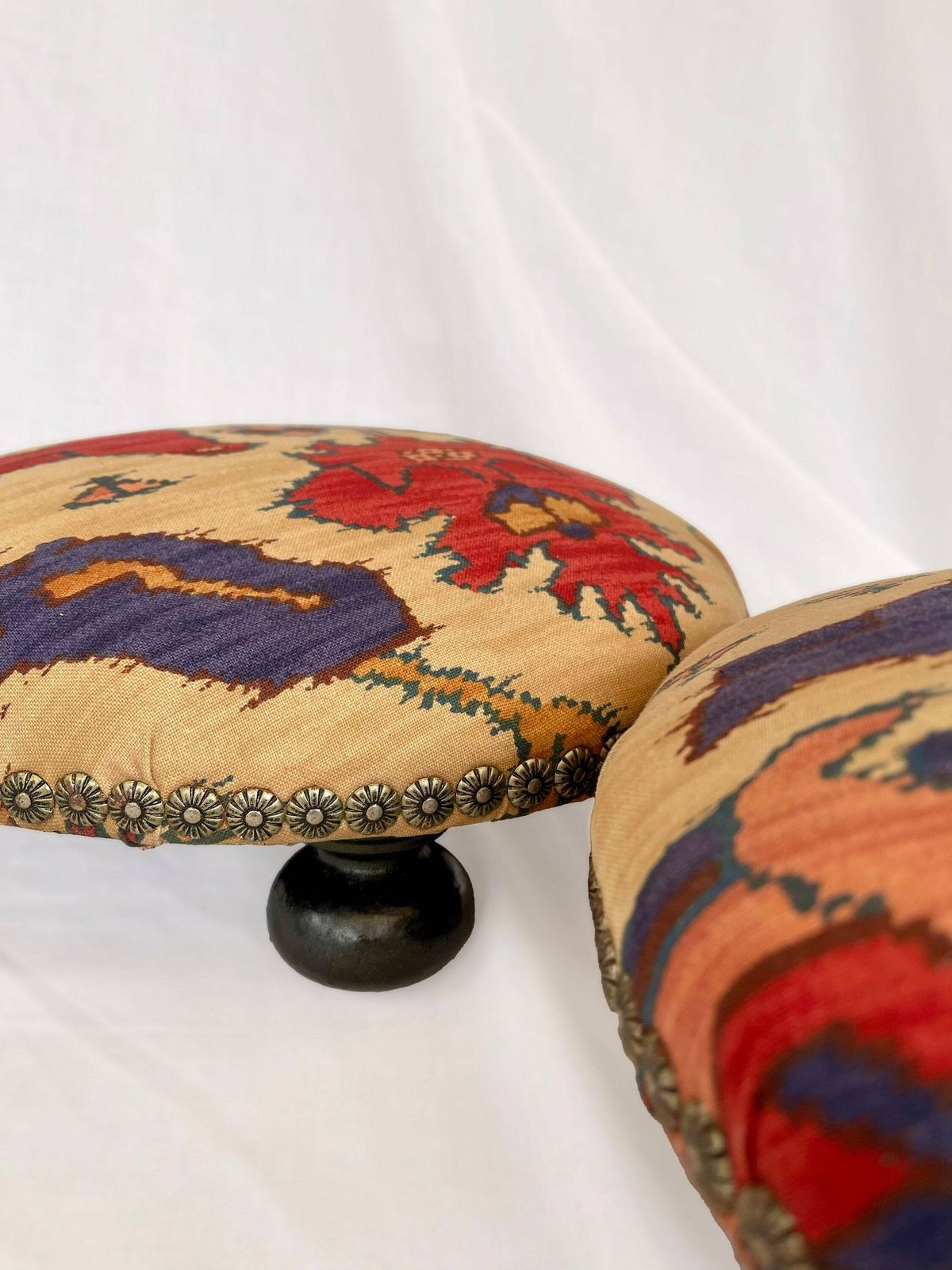 Antique French Style Foot Stools In Original Fabric With Floral Brass Flower Stud Detailing And Three Wooden Bun Feet To Base. photo for sale