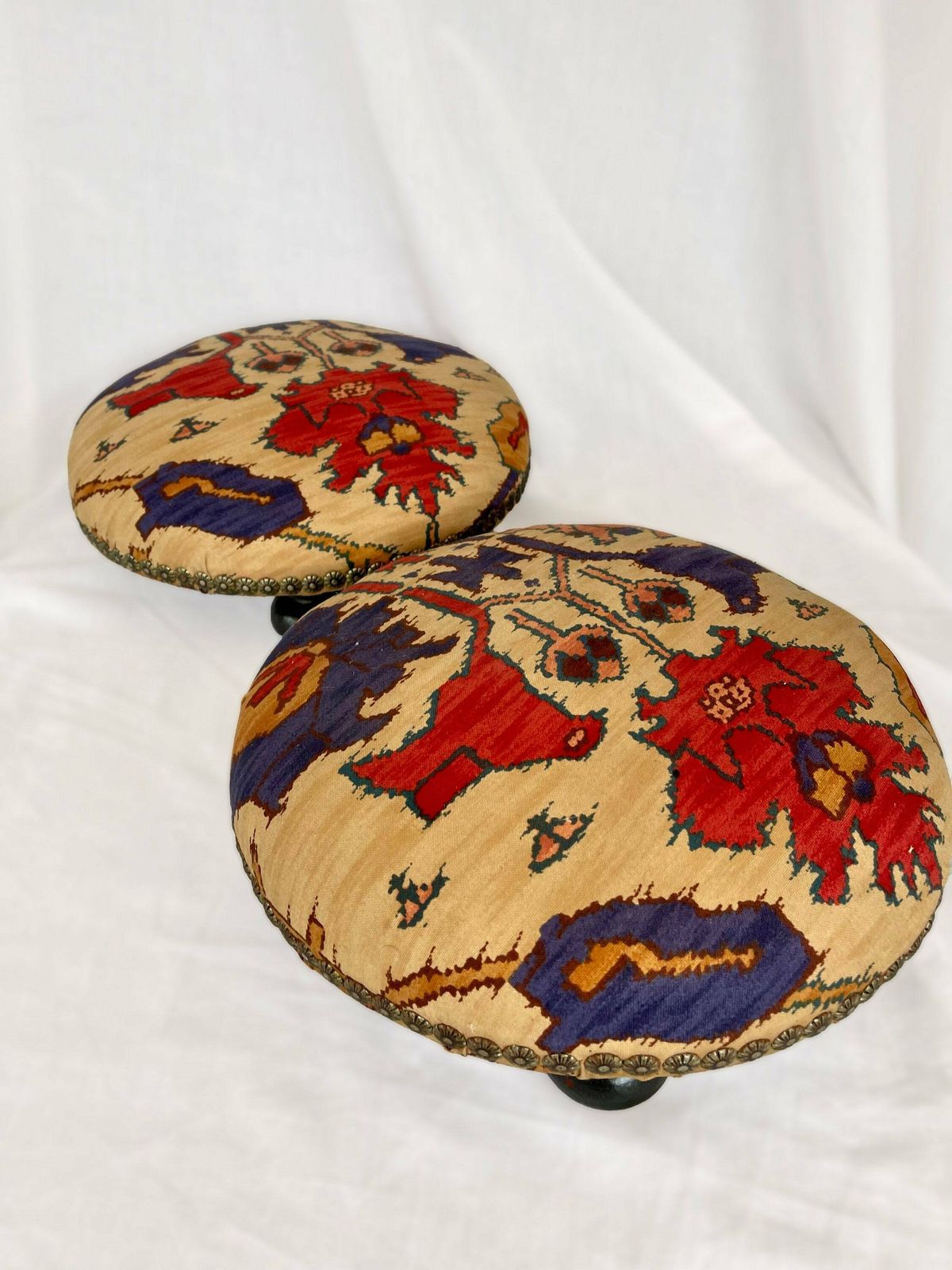 Antique French Style Foot Stools In Original Fabric With Floral Brass Flower Stud Detailing And Three Wooden Bun Feet To Base. photo Furniture