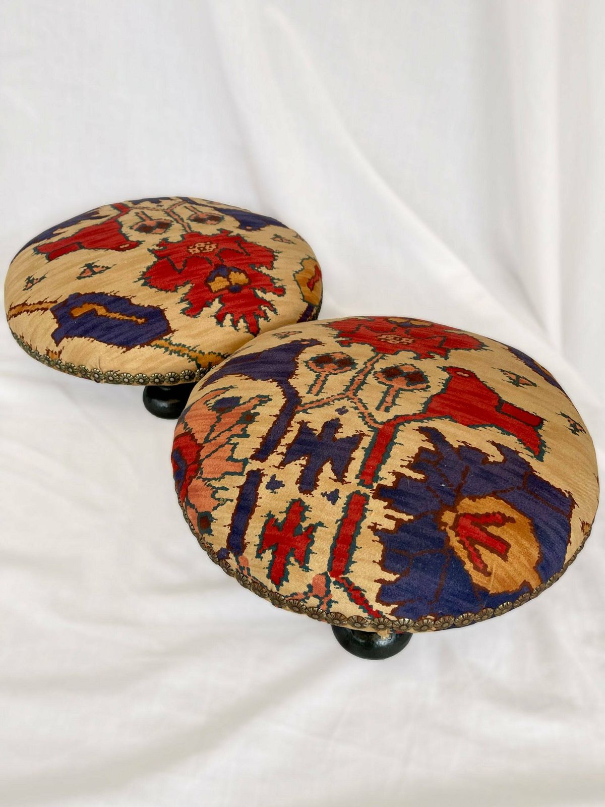 Antique French Style Foot Stools In Original Fabric With Floral Brass Flower Stud Detailing And Three Wooden Bun Feet To Base. photo vinterior