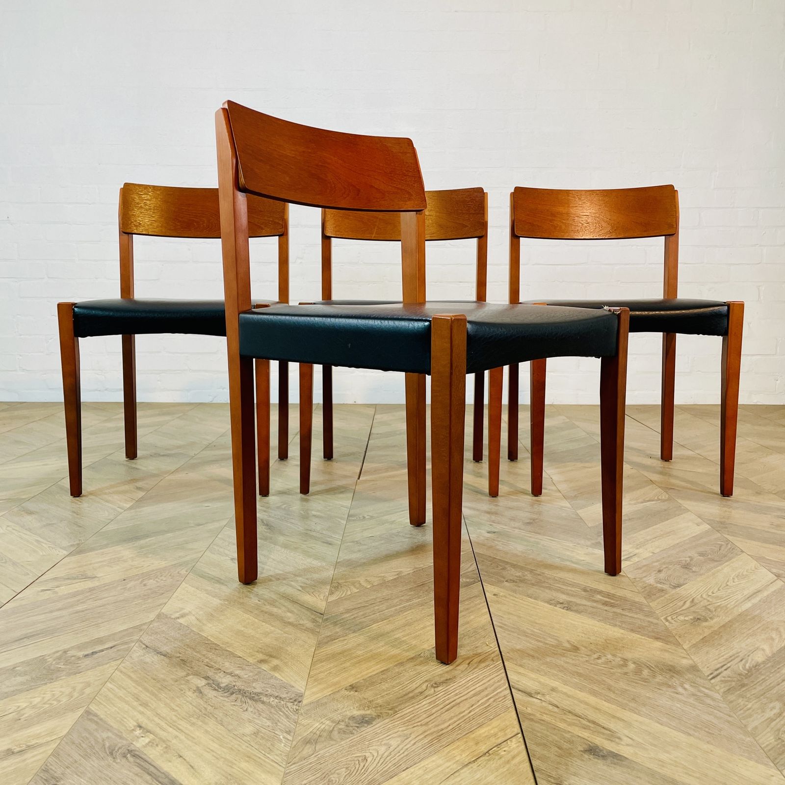 photo furniture Mid Century Black Vinyl Dining Chairs, After Arne Vodder, Set Of 4, 1970s