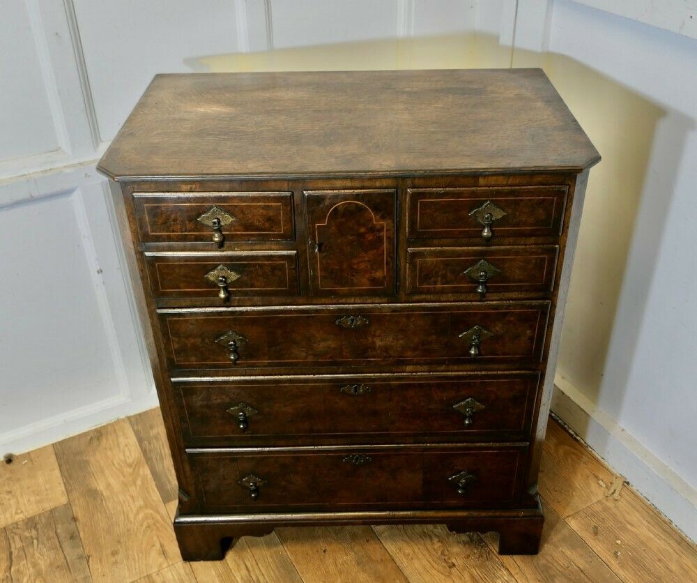 A Fine Bur Walnut And Oak Chest Of Drawers photo furniture