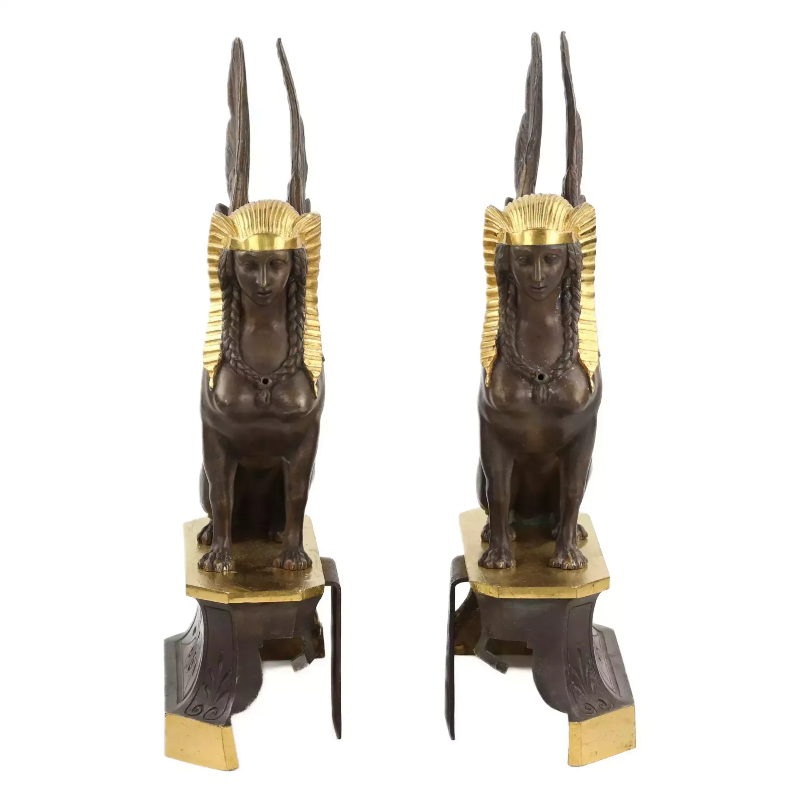 A Pair Of Patinated And Gilded Bronze Firewood Stands In The Shape Of Winged Sphinxes. 19th Century. photo for sale