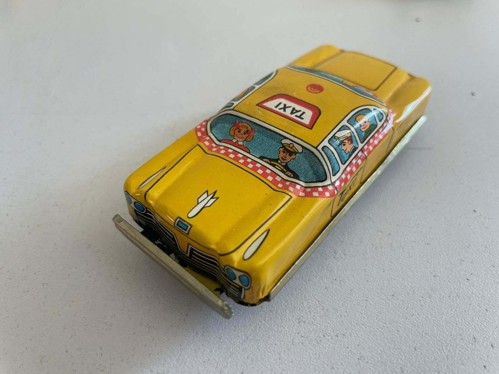 Nt Tin Taxi Toy Car, Set Of 6, Made In Japan photo for sale