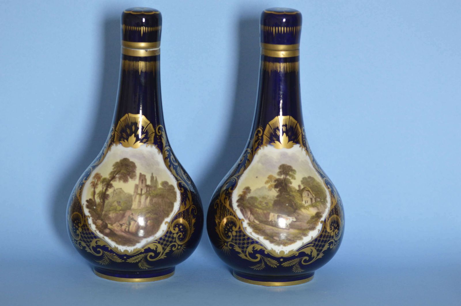 A Pair Of C1830 Derby Porcelain Blue Ground Bottle Vases And Covers photo furniture