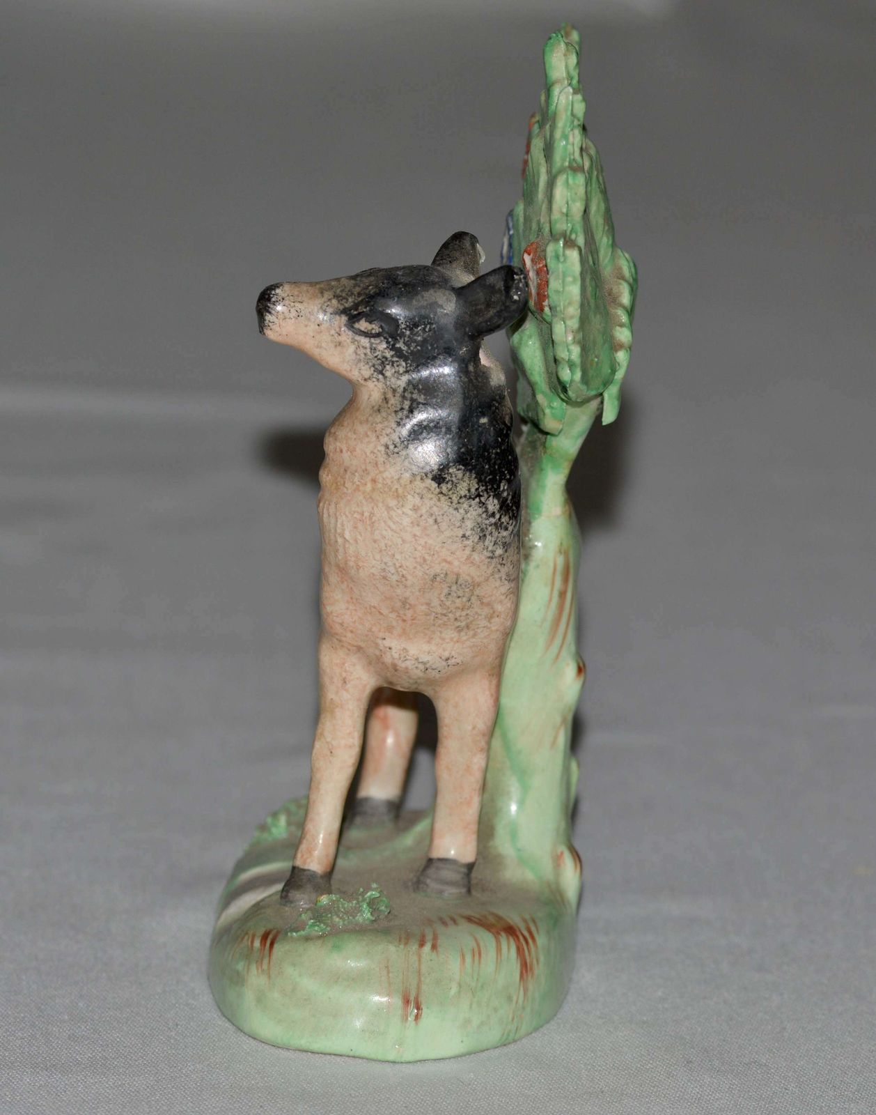 A 19th Century Staffordshire Model Of A Black And Tan Deer photo for sale