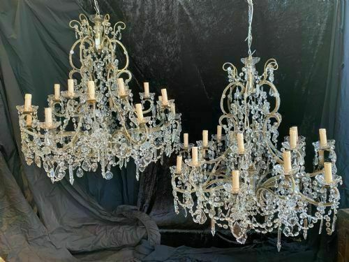 A Large Pair Of Eighteen Light Florentine Antique Chandeliers