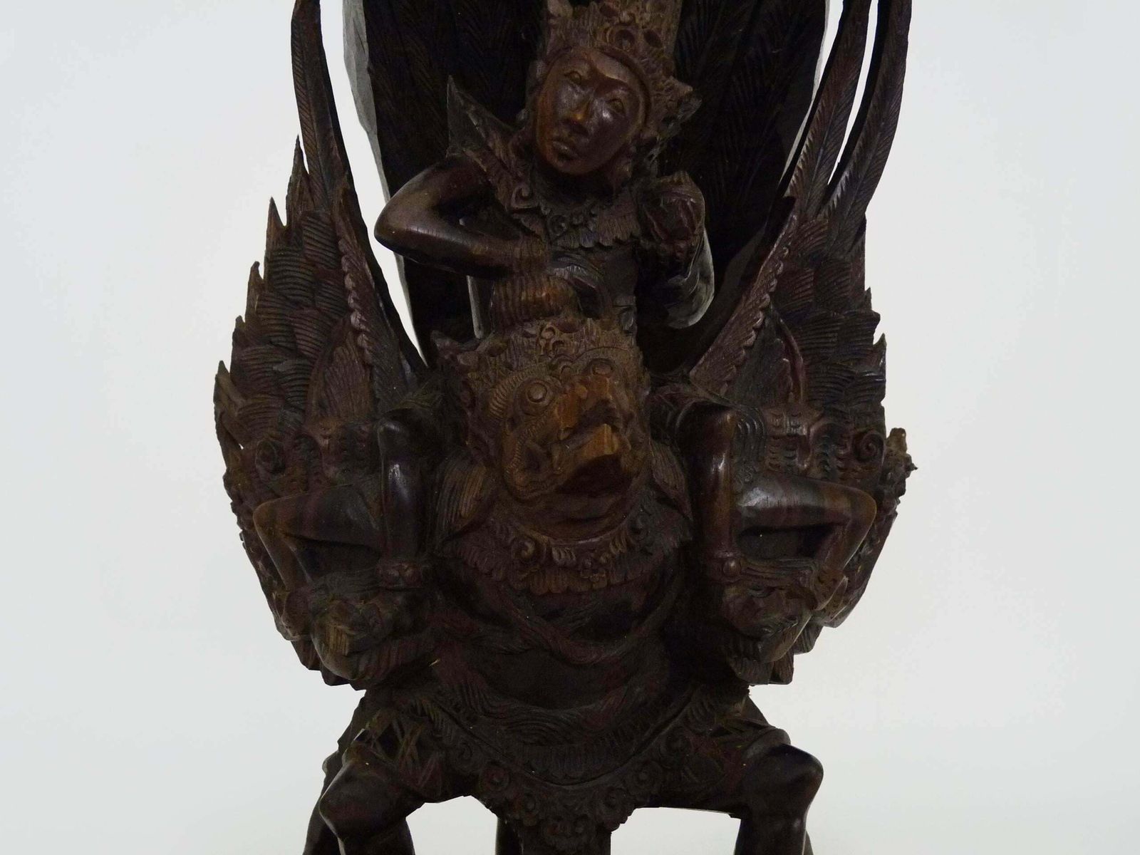 Carved Wooden Statue Of Vishnu Riding Garuda. Bali Indonesia. 1930s photo Home Decor