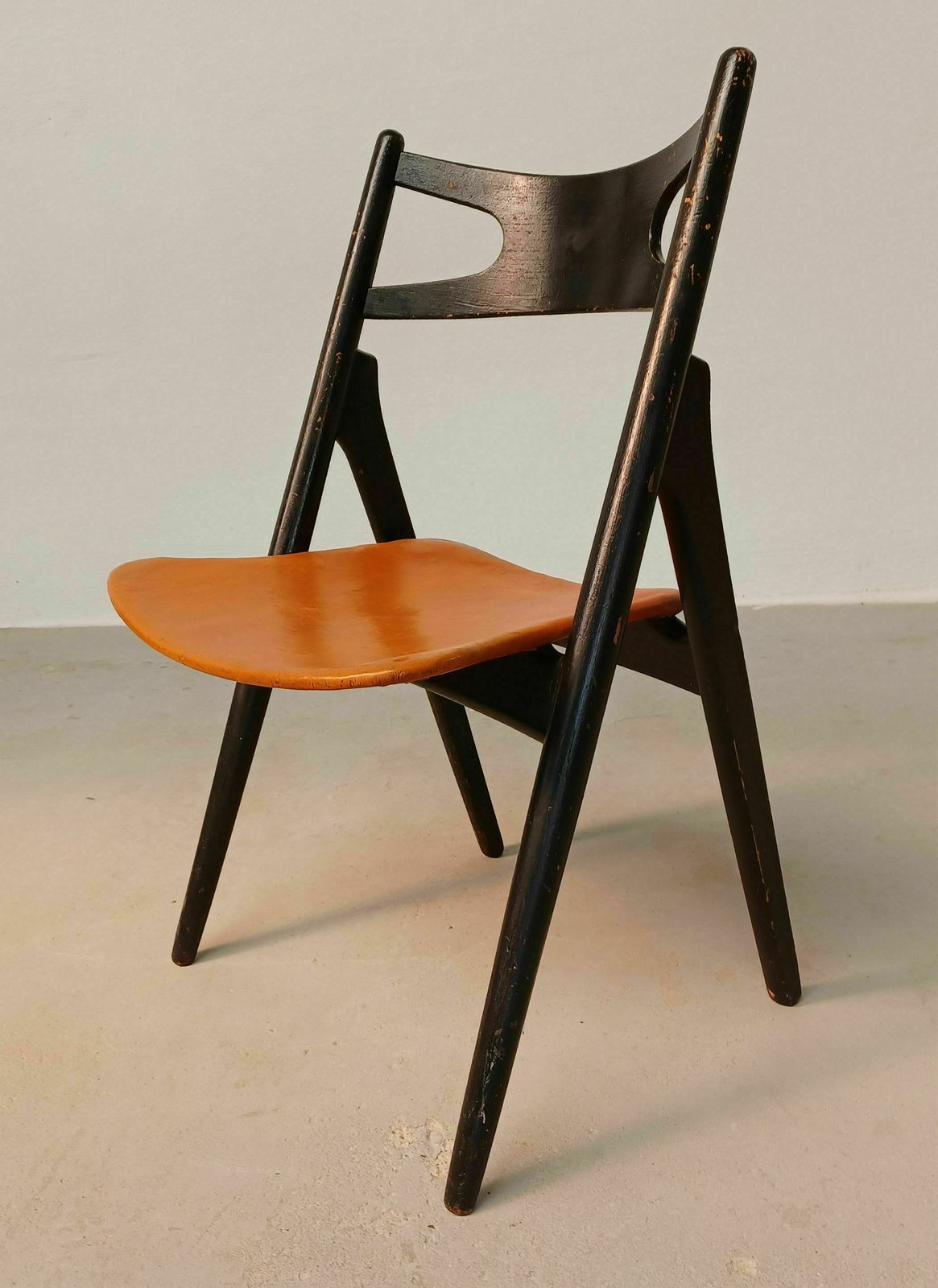 Patinated Hans Wegner Sawbuck Chair With Original Leather 1950s