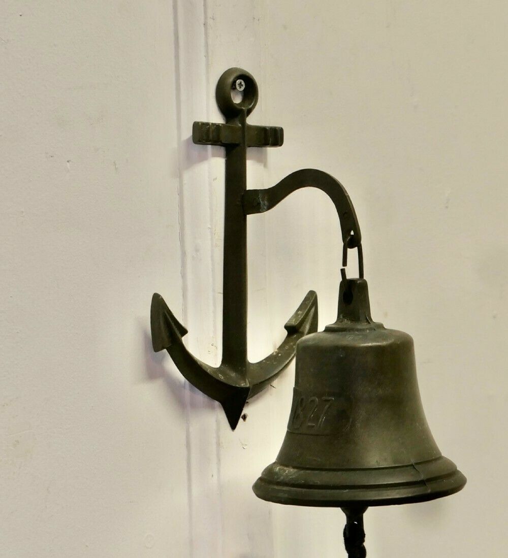 Wall Hanging Bronze Door Bell On An Anchor photo 534.0