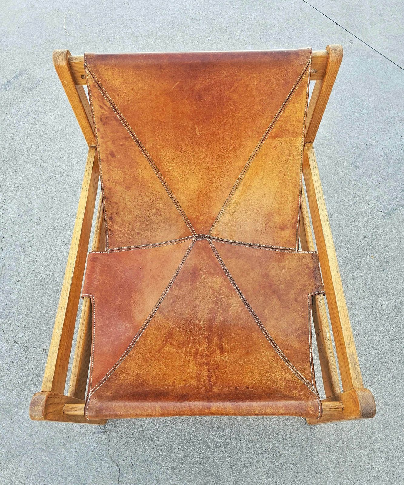 Brazilian Mid Century Modern Cognac Leather Sling Chair With Beautiful Patina // Made In Brazil In 1970s photo furniture