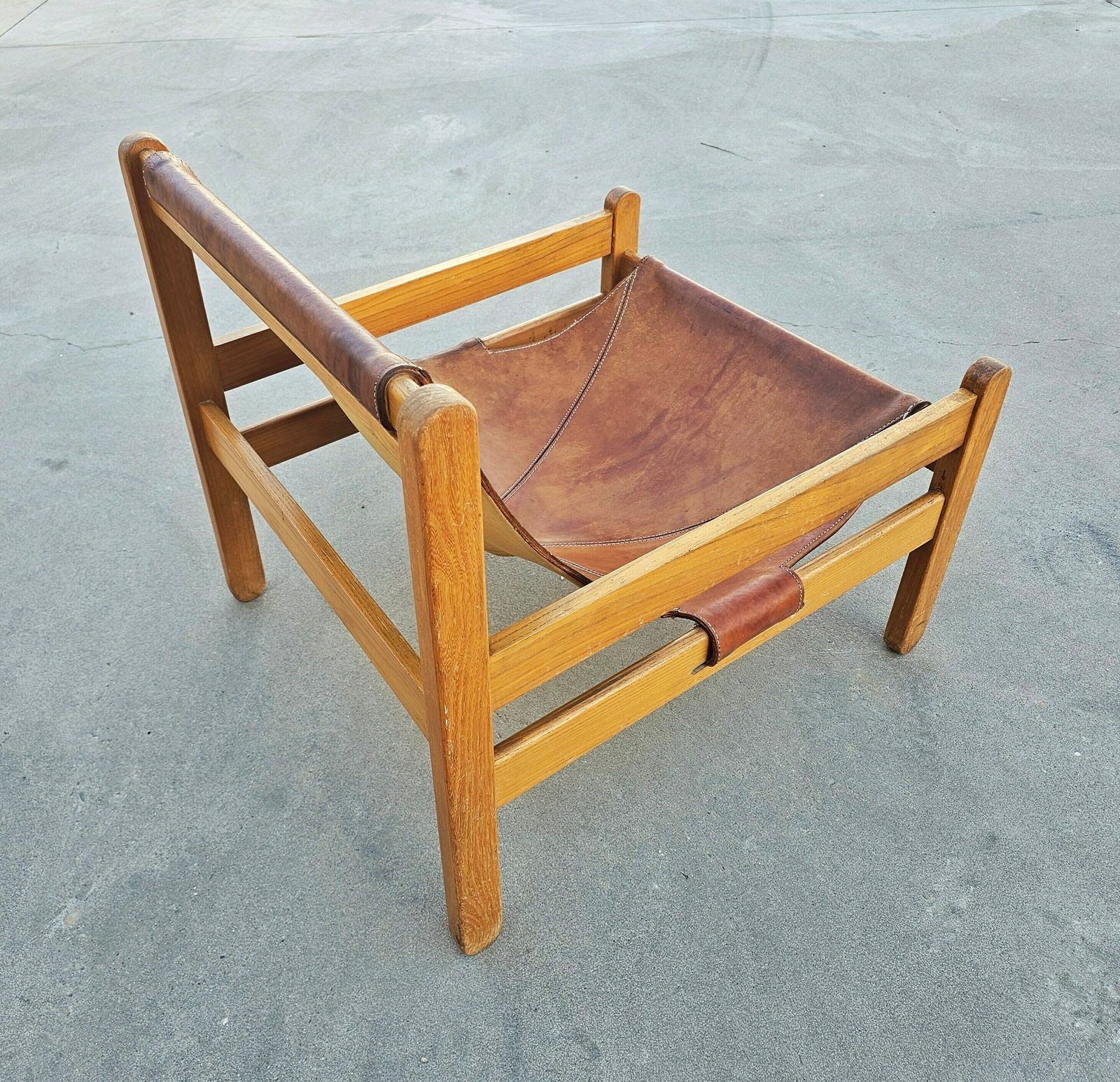 Brazilian Mid Century Modern Cognac Leather Sling Chair With Beautiful Patina // Made In Brazil In 1970s photo for sale