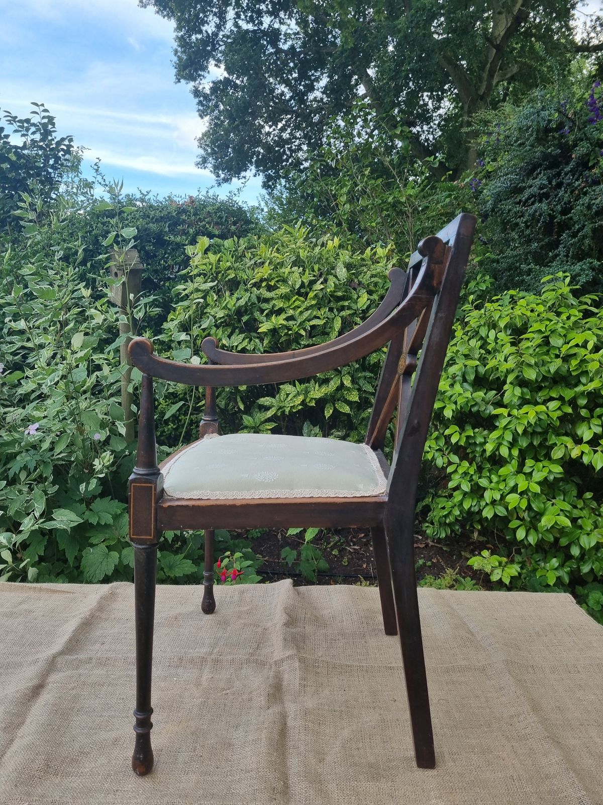 Antique Wooden Chair With Intricate Detailing And Upholstered Seat photo vinterior