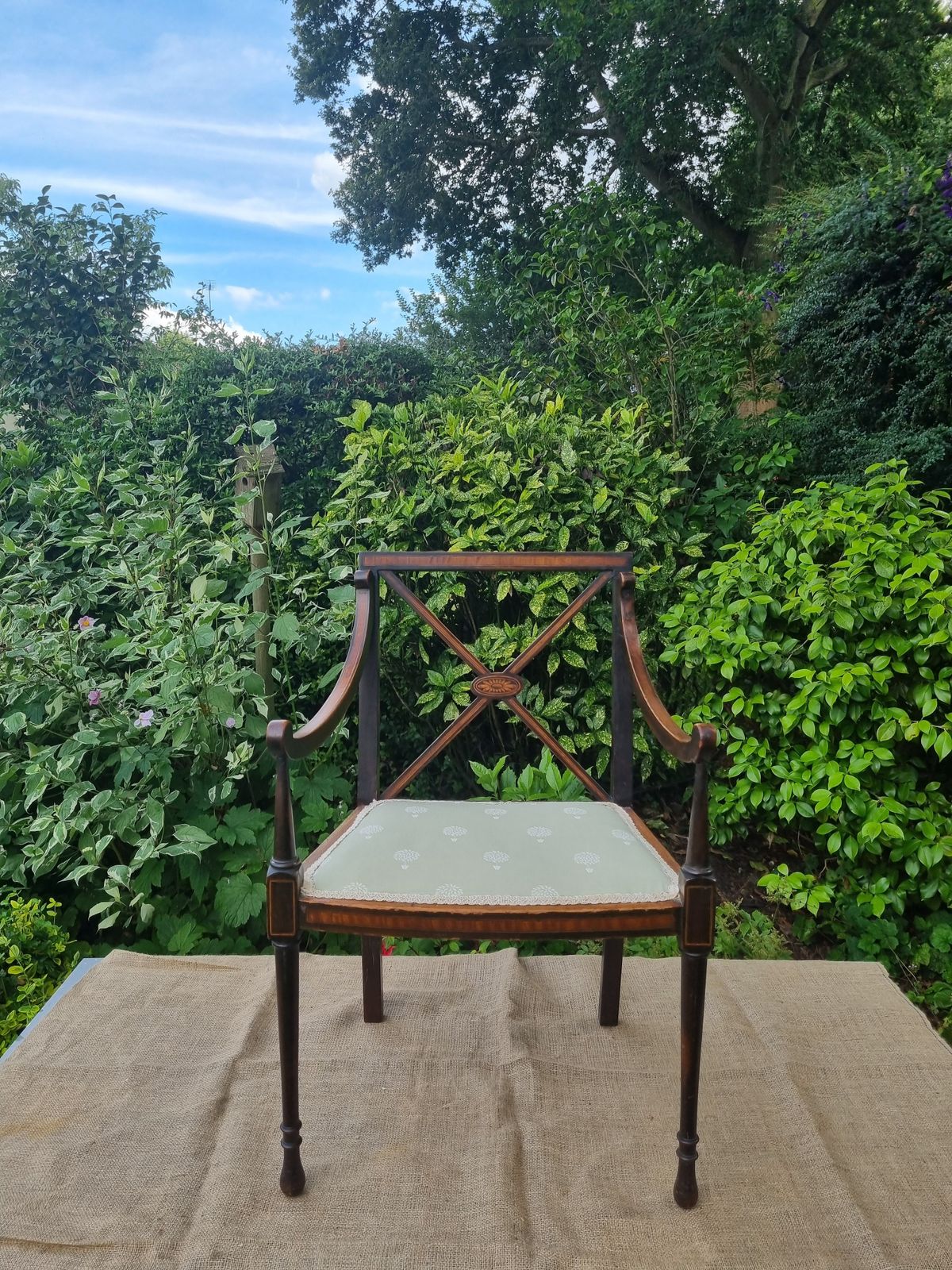 Furniture Antique Wooden Chair With Intricate Detailing And Upholstered Seat photo