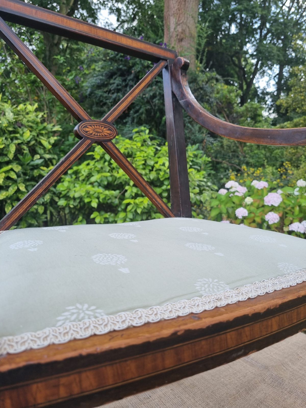 115.0 Antique Wooden Chair With Intricate Detailing And Upholstered Seat photo