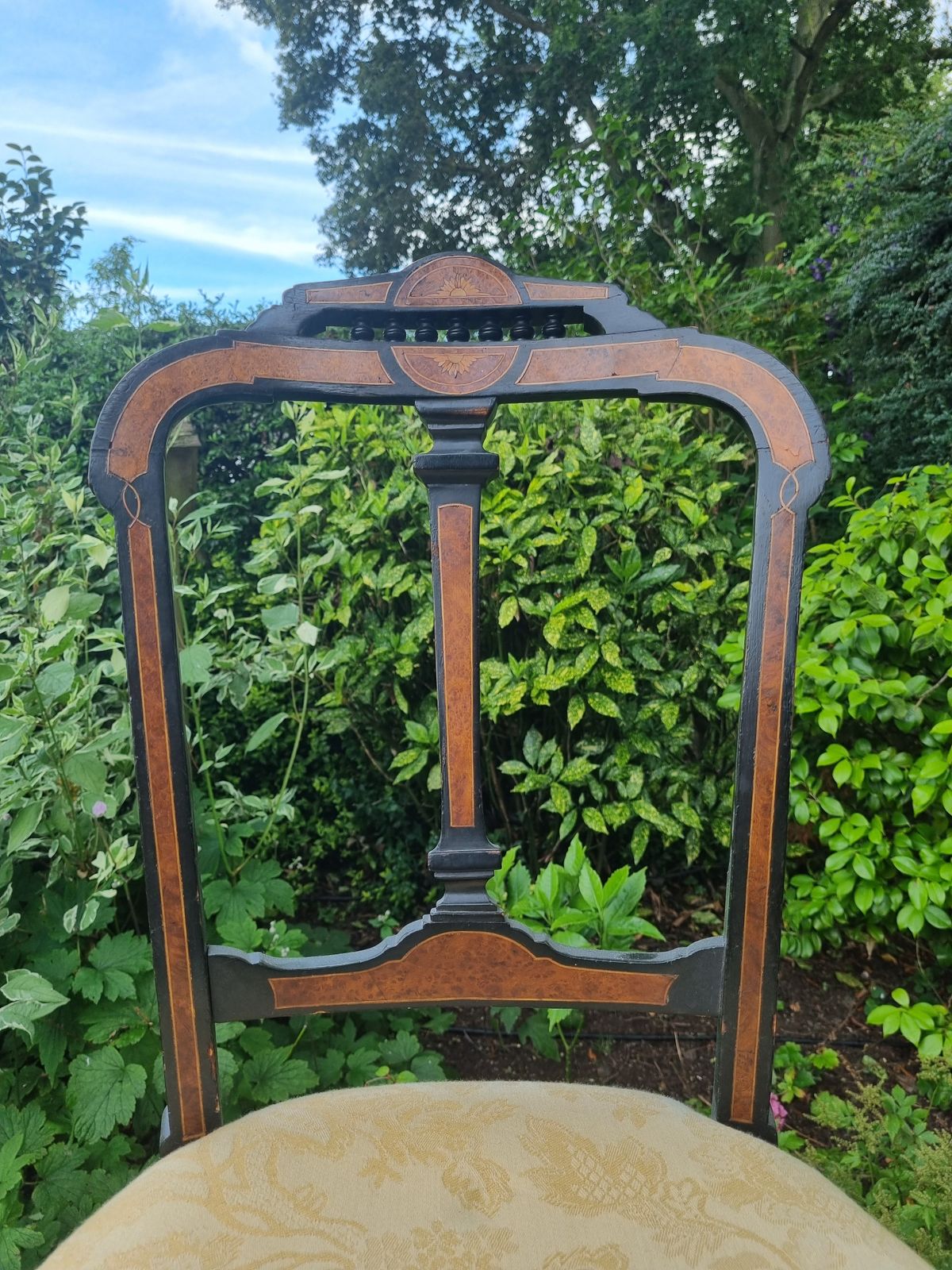 photo furniture Ornate Carved Wood Chair With Gold Damask Upholstery