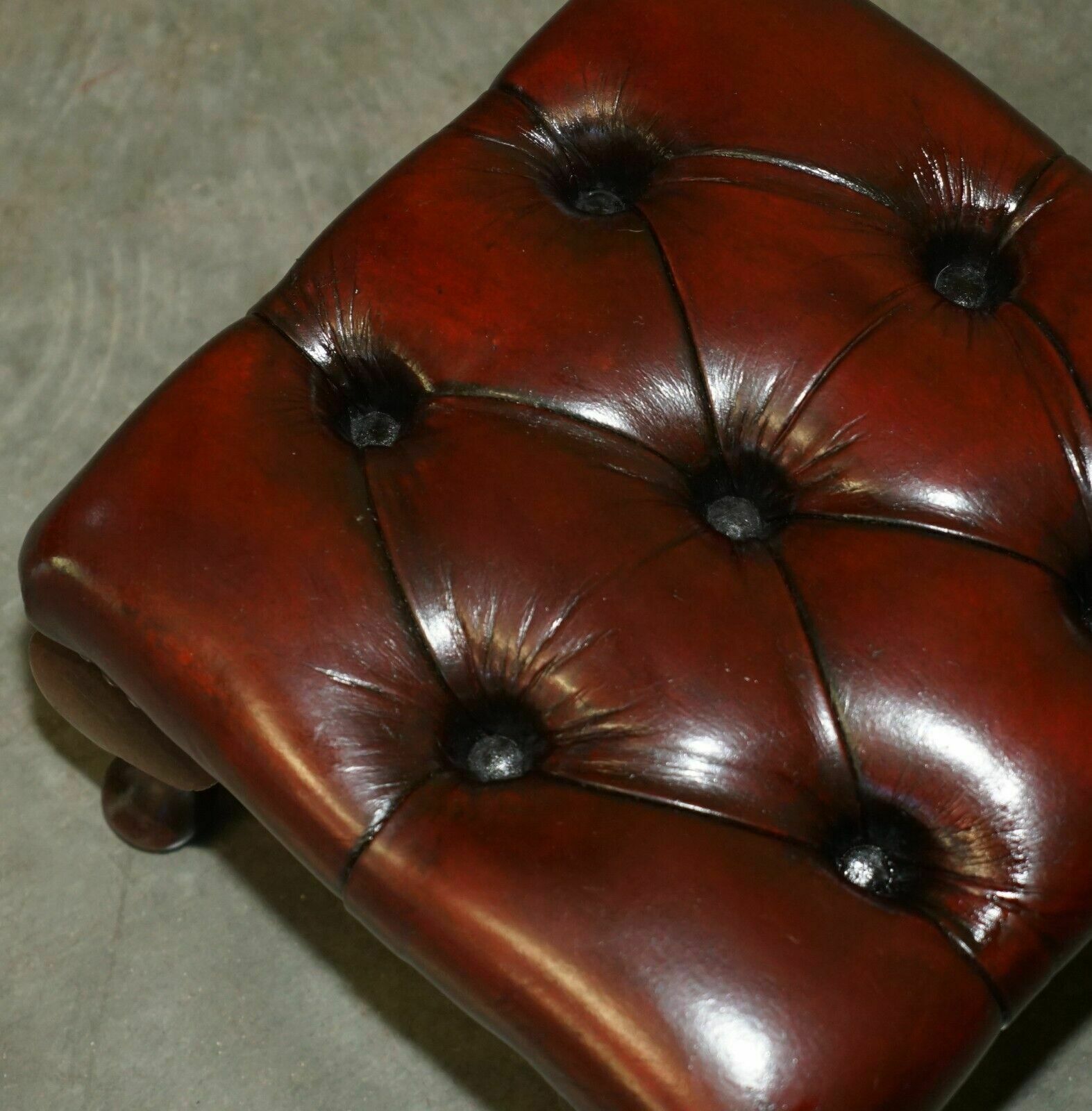 photo vinterior Pair Of Vintage Chesterfield Tufted Wingback Armchair Oxblood Leather Footstools