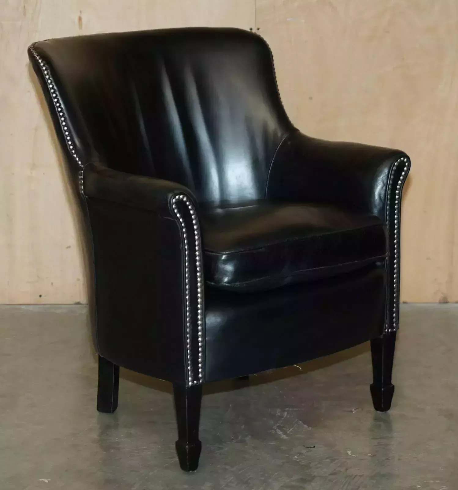 photo vintage Pair Of Vintage Black Leather Tub Club Armchairs With Hand Studded Upholstery