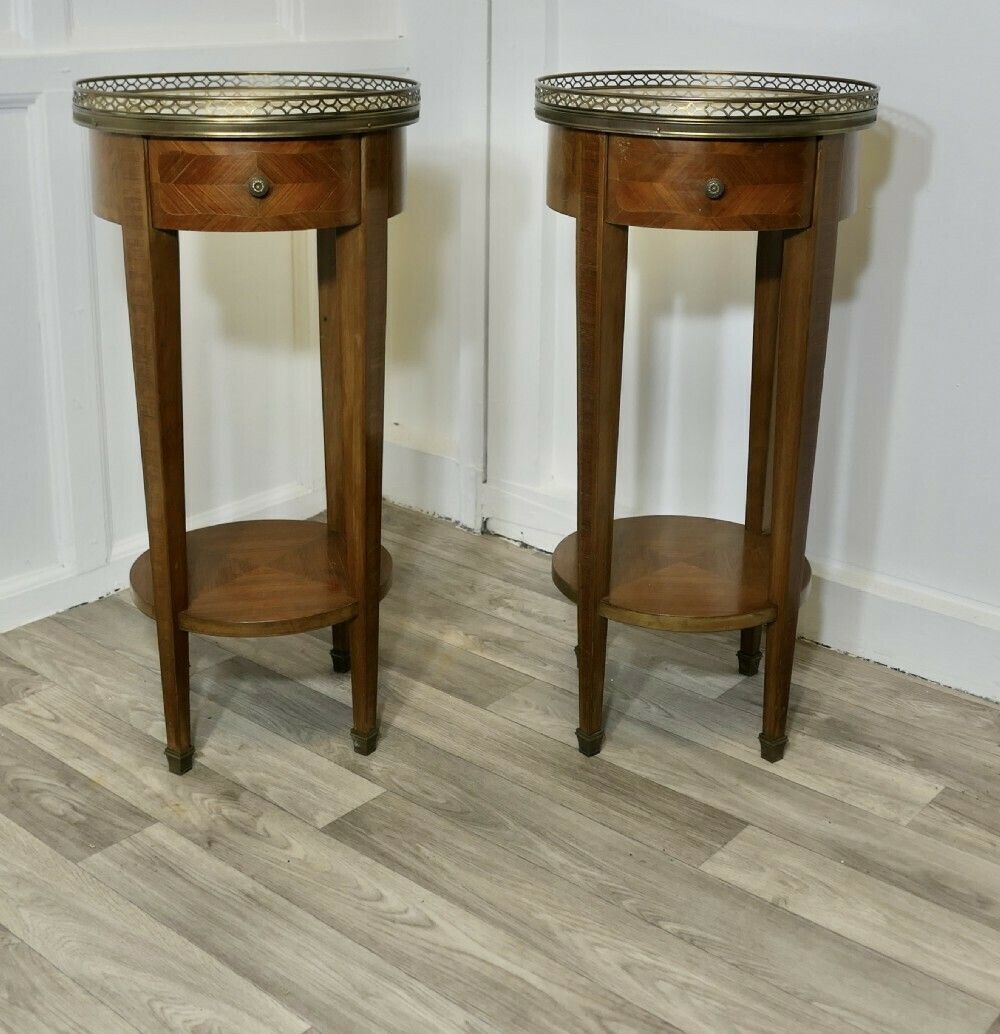 A Pair Of French Circular Side Tables With Drawers