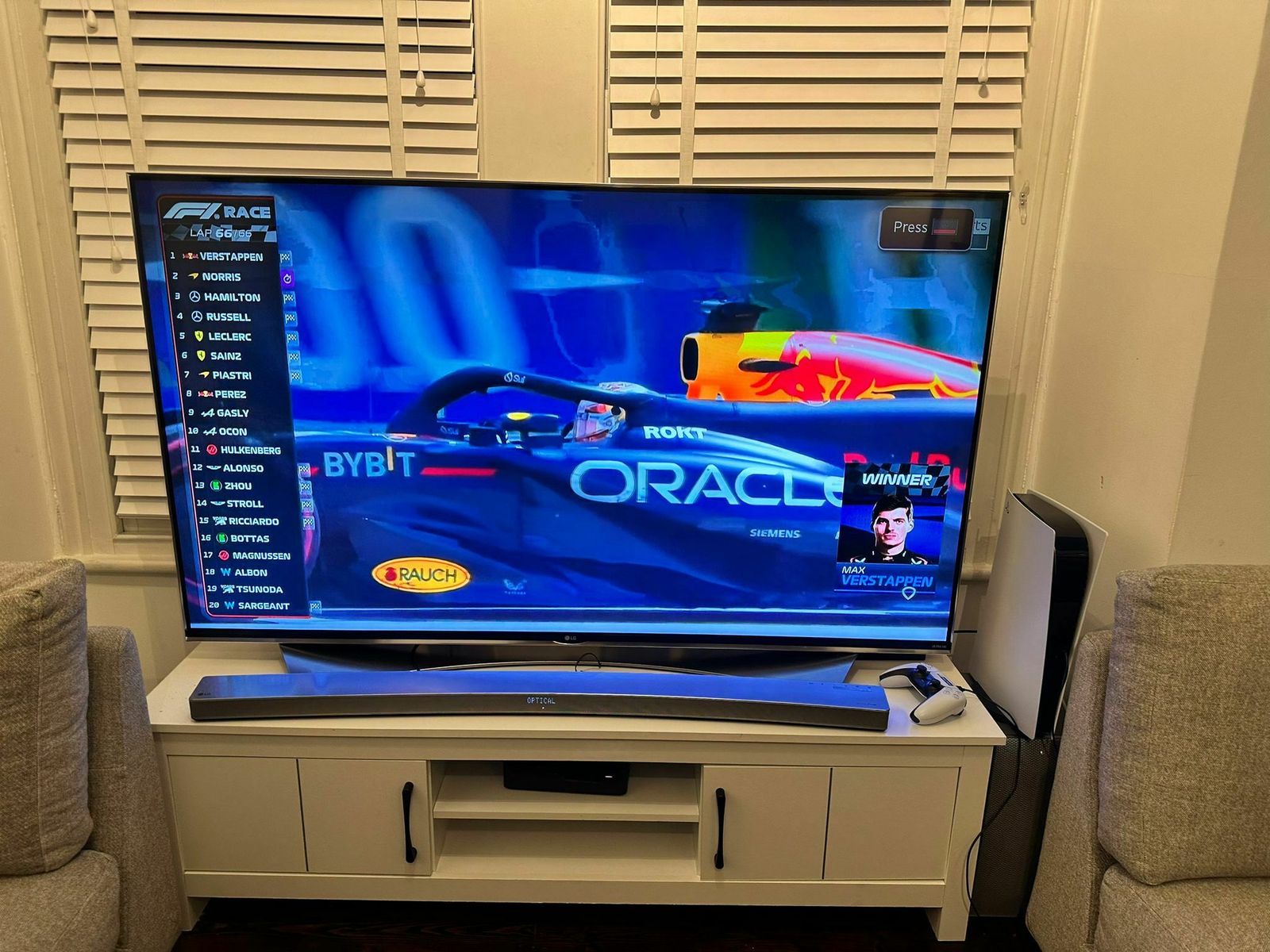 65" Lg Tv With Sound Bar (Foc Tv Stand) photo furniture